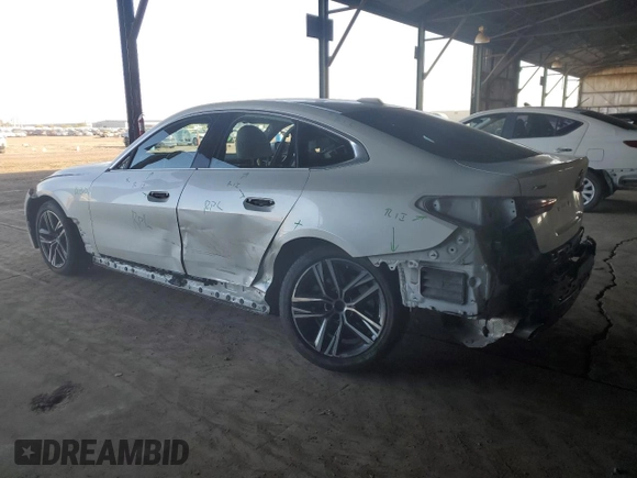 2023 BMW 4 Series 430i xDrive with VIN WBA73AV06PFN88754, listed as a Copart auction lot 80533254 with 28,502 mi miles and Salvage title. Bid and sale history available at DreamBid. Image 2.