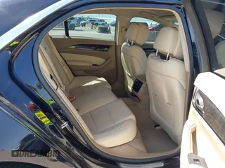2014 Cadillac CTS Luxury RWD z VIN 1G6AR5SX3E0196348, wystawiony jako IAAI lot #42282732 z przebiegiem 130 956 mil mil oraz . Historia ofert i sprzedaży dostępna na DreamBid. Obrazek 8.
