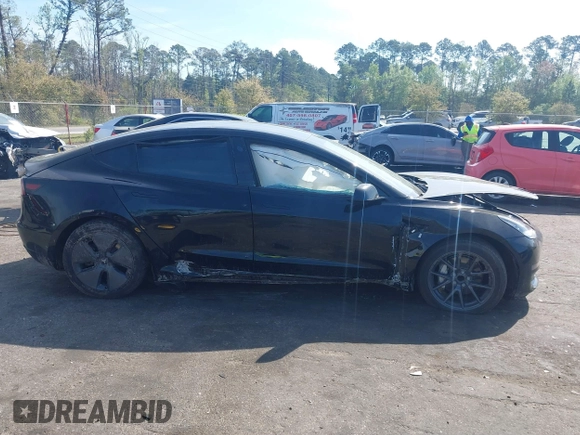 2023 Tesla Model 3 with VIN 5YJ3E1EA3PF681515, listed as a IAAI auction lot 41899053 with 15,985 mi miles and . Bid and sale history available at carsss.com. Image 13.