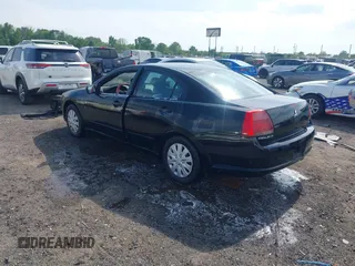 2004 Mitsubishi Galant ES z VIN 4A3AB36F94E138251, wystawiony jako IAAI lot #42064400 z przebiegiem 176 048 mil mil oraz . Historia ofert i sprzedaży dostępna na DreamBid. Obrazek 3.