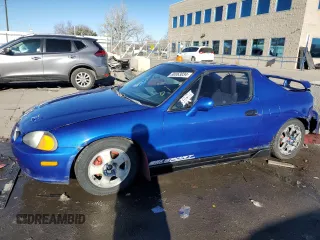 1994 Honda del Sol S with VIN JHMEG1142RS000753, listed as a Copart auction lot 80063034 with 214,736 mi miles and Salvage Title. Bid and sale history available at carsss.com. Image 1.
