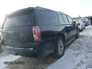 2015 GMC Yukon XL SLT with VIN 1GKS2HKC6FR257133, listed as a IAAI auction lot 41385913 with 150,238 mi miles. Bid and sale history available at carsss.com. Image 4.