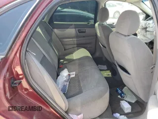 2007 Ford Taurus SE z VIN 1FAFP53U07A165204, wystawiony jako Copart lot #52170345 z przebiegiem Nie podano mil oraz Szkoda całkowita • Salvage title. Historia ofert i sprzedaży dostępna na DreamBid. Obrazek 10.