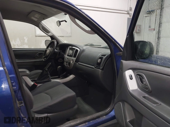 2006 Mazda Tribute i with VIN 4F2YZ92Z16KM37284, listed as a IAAI auction lot 41755952 with 129,284 mi miles and . Bid and sale history available at carsss.com. Image 5.