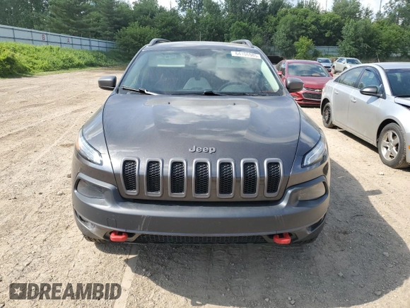 2014 Jeep Cherokee Trailhawk with VIN 1C4PJMBS4EW187085, listed as a Copart auction lot 64106985 with 166,467 mi miles and Clean title. Bid and sale history available at DreamBid. Image 5.
