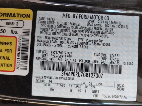 2016 Ford Fusion Titanium Hybrid with VIN 3FA6P0RU7GR127307, listed as a IAAI auction lot 41944427 with 128,076 mi miles. Bid and sale history available at carsss.com. Image 9.