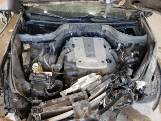 2010 Infiniti FX35 with VIN JN8AS1MWXAM854771, listed as a Copart auction lot 70682914 with 163,118 mi miles and Salvage Title. Bid and sale history available at carsss.com. Image 12.