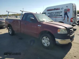 2005 Ford F-150 XL with VIN 1FTRF12W65KC58208, listed as a Copart auction lot 82281114 with 129,774 mi miles and Salvage title. Bid and sale history available at DreamBid. Image 4.