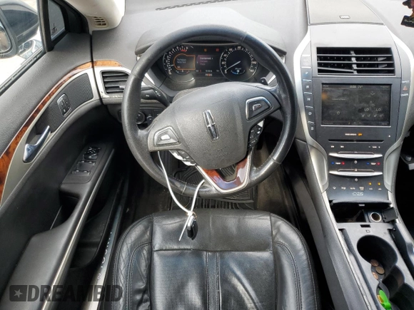 2013 Lincoln MKZ z VIN 3LN6L2G99DR826820, wystawiony jako Copart lot #57530205 z przebiegiem 161 494 mil mil oraz Czysty tytuł • Clean title. Historia ofert i sprzedaży dostępna na DreamBid. Obrazek 8.