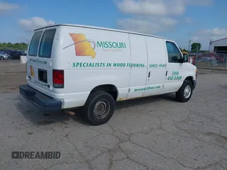 2013 Ford Econoline Cargo Commercial with VIN 1FTNE2EWXDDA52072, listed as a IAAI auction lot 42523635 with 262,097 mi miles and . Bid and sale history available at DreamBid. Image 4.