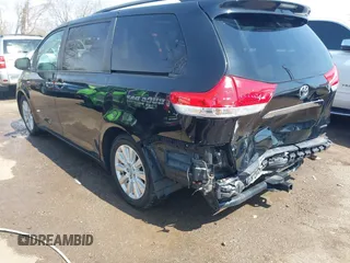 2013 Toyota Sienna XLE AAS with VIN 5TDYK3DC6DS387708, listed as a IAAI auction lot 41902860 with 191,766 mi miles and . Bid and sale history available at carsss.com. Image 3.