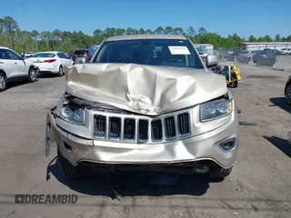 2014 Jeep Grand Cherokee Limited with VIN 1C4RJEBG4EC528934, listed as a IAAI auction lot 42033511 with 63,601 mi miles and . Bid and sale history available at DreamBid. Image 12.