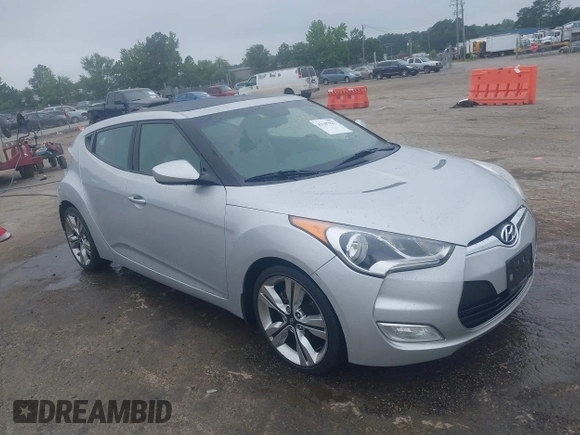 2012 Hyundai Veloster w/Black Int with VIN KMHTC6AD1CU034787, listed as a IAAI auction lot 42607847 with 126,912 mi miles and . Bid and sale history available at DreamBid. Image 1.