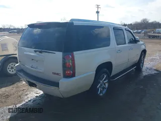 2010 GMC Yukon XL Denali with VIN 1GKUKMEF6AR157775, listed as a IAAI auction lot 41521509 with 201,836 mi miles. Bid and sale history available at carsss.com. Image 4.