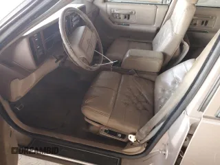 1991 Cadillac Seville z VIN 1G6KS53B5MU825563, wystawiony jako Copart lot #81541154 z przebiegiem 93 284 mil mil oraz Czysty tytuł • Clean title. Historia ofert i sprzedaży dostępna na DreamBid. Obrazek 7.