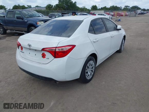 2019 Toyota Corolla L with VIN 5YFBURHE7KP908794, listed as a IAAI auction lot 38524964 with 65,069 mi miles. Bid and sale history available at carsss.com. Image 4.