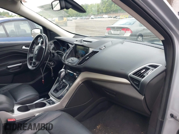 2013 Ford Escape SEL с VIN 1FMCU9H97DUC06371, выставлен на аукционе IAAI как лот 42255108 с пробегом 158 024 миль миль и . История ставок и продаж доступна на DreamBid. Изображение 5.