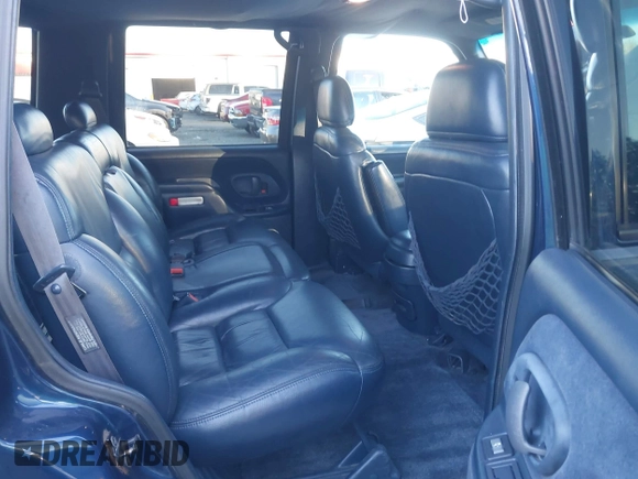 1997 Chevrolet Tahoe z VIN 1GNEK13R4VJ418974, wystawiony jako IAAI lot #41560411 z przebiegiem 198 170 mil mil oraz . Historia ofert i sprzedaży dostępna na DreamBid. Obrazek 8.