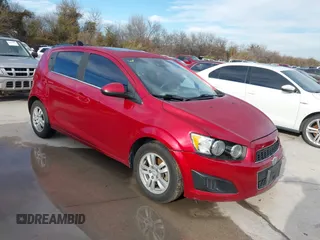 2014 Chevrolet Sonic LT with VIN 1G1JC6SB9E4232389, listed as a IAAI auction lot 41472291 with 165,711 mi miles. Bid and sale history available at carsss.com. Image 1.