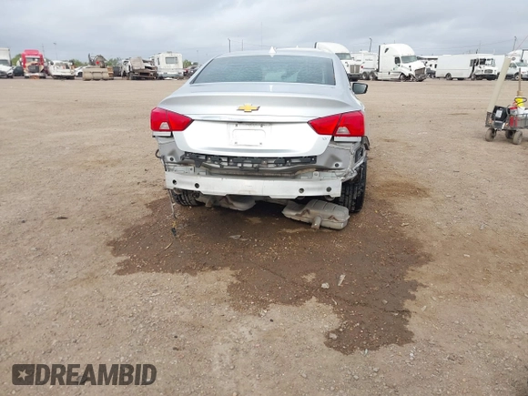 2014 Chevrolet Impala LT with VIN 2G1125S38E9102607, listed as a IAAI auction lot 41860235 with 128,599 mi miles and . Bid and sale history available at DreamBid. Image 18.