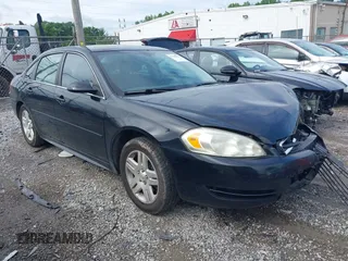 2014 Chevrolet Impala LT z VIN 2G1WB5E34E1148550, wystawiony jako IAAI lot #42342591 z przebiegiem 160 791 mil mil oraz . Historia ofert i sprzedaży dostępna na DreamBid. Obrazek 1.