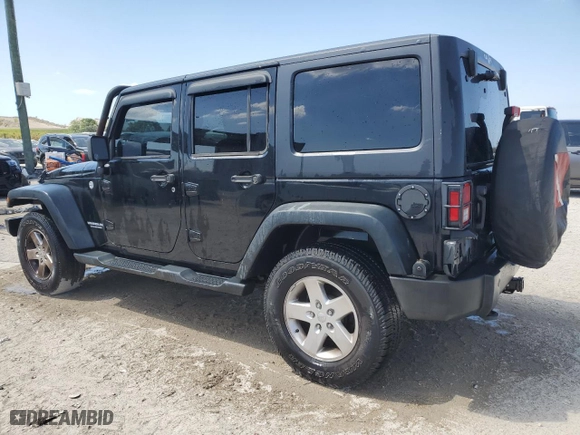 2012 Jeep Wrangler Unlimited Sport with VIN 1C4BJWDGXCL265155, listed as a Copart auction lot 49253195 with 129,774 mi miles and Clean Title. Bid and sale history available at carsss.com. Image 2.