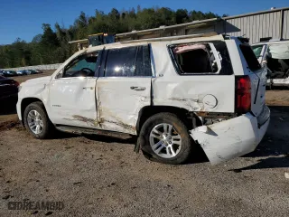 2015 Chevrolet Tahoe LS with VIN 1GNSKAKCXFR546803, listed as a Copart auction lot 81128974 with 131,482 mi miles and Salvage Title. Bid and sale history available at carsss.com. Image 2.