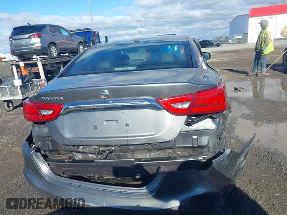 2016 Nissan Maxima Platinum with VIN 1N4AA6AP7GC409949, listed as a IAAI auction lot 41214746 with 190,853 mi miles and . Bid and sale history available at DreamBid. Image 16.
