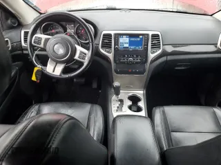 2011 Jeep Grand Cherokee Laredo with VIN 1J4RR4GG4BC569808, listed as a Copart auction lot 56040105 with 167,067 mi miles and Salvage title. Bid and sale history available at DreamBid. Image 8.