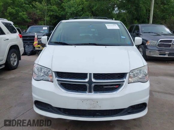 2015 Dodge Grand Caravan SXT with VIN 2C4RDGCG2FR548433, listed as a IAAI auction lot 42121256 with 161,459 mi miles and . Bid and sale history available at DreamBid. Image 6.