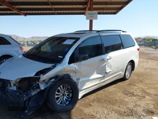 2015 Toyota Sienna XLE with VIN 5TDYK3DC8FS629577, listed as a IAAI auction lot 42019641 with 173,259 mi miles. Bid and sale history available at carsss.com. Image 2.