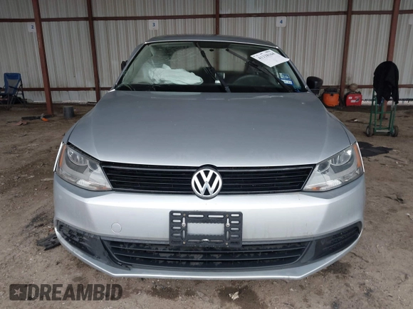 2014 Volkswagen Jetta Sedan S with VIN 3VW2K7AJ3EM310020, listed as a IAAI auction lot 41338164 with 76,456 mi miles. Bid and sale history available at carsss.com. Image 12.