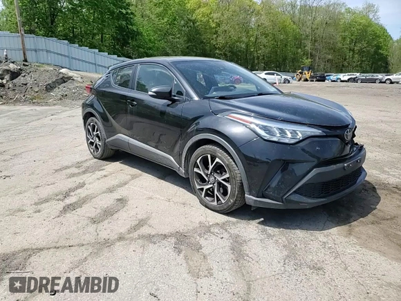 2020 Toyota C-HR LE z VIN JTNKHMBX1L1093317, wystawiony jako Copart lot #55286375 z przebiegiem 115 640 mil mil oraz Szkoda całkowita • Salvage title. Historia ofert i sprzedaży dostępna na DreamBid. Obrazek 14.