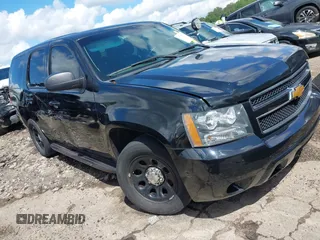 2012 Chevrolet Tahoe Commercial z VIN 1GNLC2E00CR306289, wystawiony jako IAAI lot #42187156 z przebiegiem 123 306 mil mil oraz . Historia ofert i sprzedaży dostępna na DreamBid. Obrazek 1.