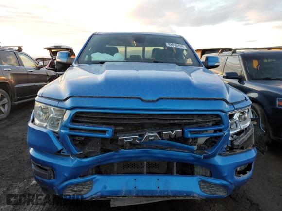 2021 Ram 1500 Big Horn with VIN 1C6SRFBT3MN586735, listed as a Copart auction lot 82870194 with 55,744 mi miles and Salvage Title. Bid and sale history available at carsss.com. Image 5.