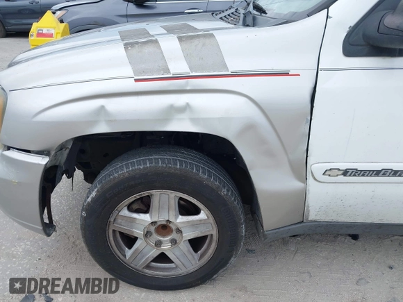 2003 Chevrolet TrailBlazer EXT LT with VIN 1GNES16S736235213, listed as a IAAI auction lot 41237480 with 297,434 mi miles and . Bid and sale history available at DreamBid. Image 6.