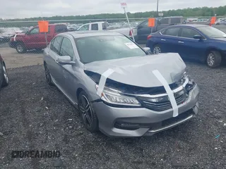 2017 Honda Accord Touring with VIN 1HGCR3F98HA033961, listed as a IAAI auction lot 42192032 with 93,658 mi miles and . Bid and sale history available at DreamBid. Image 1.