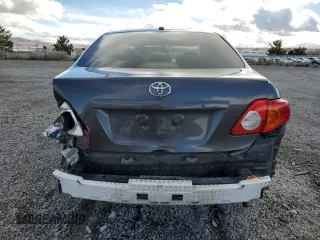 2009 Toyota Corolla with VIN JTDBL40E099020602, listed as a Copart auction lot 48598715 with 132,906 mi miles and Salvage Title. Bid and sale history available at carsss.com. Image 6.