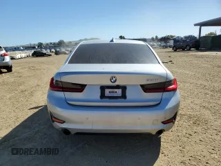 2020 BMW 3 Series 330i with VIN WBA5R1C02LFH39000, listed as a Copart auction lot 46874295 with Not provided miles and Salvage title. Bid and sale history available at DreamBid. Image 6.