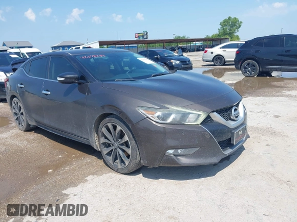 2016 Nissan Maxima SR z VIN 1N4AA6AP0GC400686, wystawiony jako IAAI lot #42378284 z przebiegiem 139 996 mil mil oraz . Historia ofert i sprzedaży dostępna na DreamBid. Obrazek 1.