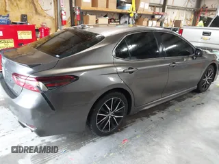 2021 Toyota Camry SE Nightshade with VIN 4T1G11AK9MU407567, listed as a IAAI auction lot 41998316 with 81,801 mi miles and . Bid and sale history available at DreamBid. Image 4.