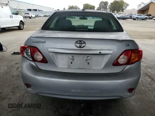 2010 Toyota Corolla with VIN 1NXBU4EE8AZ187793, listed as a Copart auction lot 63909235 with 65,164 mi miles and Salvage title. Bid and sale history available at DreamBid. Image 6.