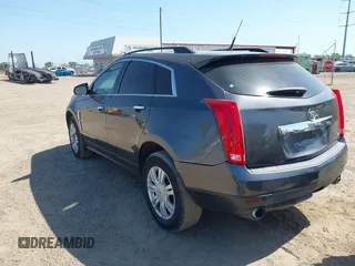 2012 Cadillac SRX with VIN 3GYFNGE32CS546815, listed as a IAAI auction lot 42014765 with 142,373 mi miles. Bid and sale history available at carsss.com. Image 3.