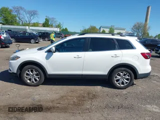 2015 Mazda CX-9 Touring with VIN JM3TB3CV1F0461403, listed as a IAAI auction lot 42148325 with 143,452 mi miles. Bid and sale history available at carsss.com. Image 14.