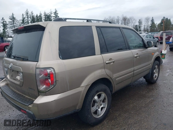 2006 Honda Pilot EX-L with VIN 2HKYF18706H529579, listed as a IAAI auction lot 41861069 with 222,641 mi miles and . Bid and sale history available at DreamBid. Image 4.