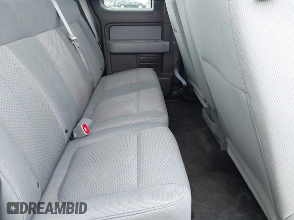 2013 Ford F-150 XL z VIN 1FTFX1CF2DFC39774, wystawiony jako IAAI lot #42330748 z przebiegiem 142 135 mil mil oraz . Historia ofert i sprzedaży dostępna na DreamBid. Obrazek 8.