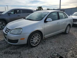 2008 Volkswagen Jetta Sedan Wolfsburg with VIN 3VWRJ71K98M189900, listed as a Copart auction lot 77866404 with 143,209 mi miles and Clean Title. Bid and sale history available at carsss.com. Image 1.
