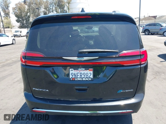 2021 Chrysler Pacifica Hybrid Touring L with VIN 2C4RC1L71MR599631, listed as a IAAI auction lot 42151965 with 67,401 mi miles and . Bid and sale history available at DreamBid. Image 16.