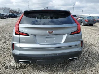 2024 Cadillac XT4 AWD Premium Luxury with VIN 1GYFZDR40RF123637, listed as a Copart auction lot 46852195 with 5,001 mi miles and Salvage title. Bid and sale history available at DreamBid. Image 6.