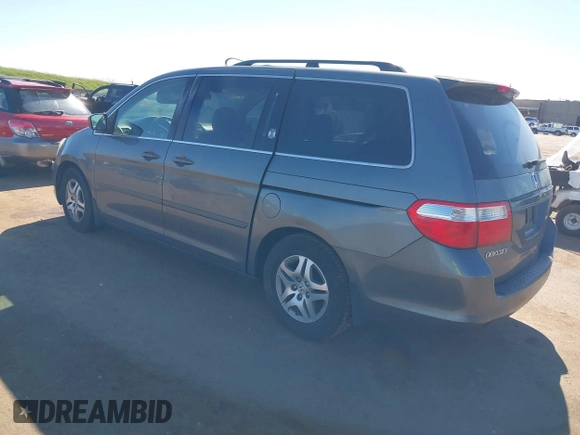 2007 Honda Odyssey EX-L z VIN 5FNRL386X7B405321, wystawiony jako IAAI lot #41703384 z przebiegiem 198 552 mil mil oraz . Historia ofert i sprzedaży dostępna na DreamBid. Obrazek 3.